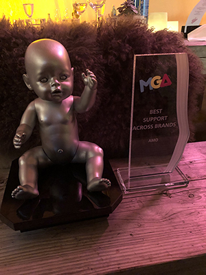 Amo Toys team recieving award.